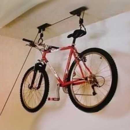 Bike-hanging-from-ceiling-using-bike-pulley-mount.jpg