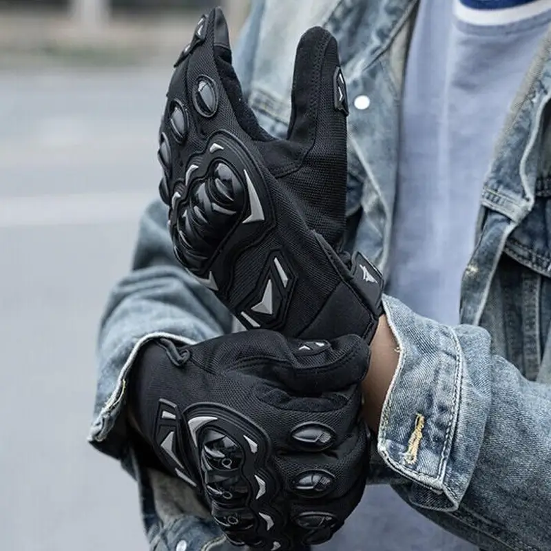 model-wearing-black-motorcycle-gloves.webp
