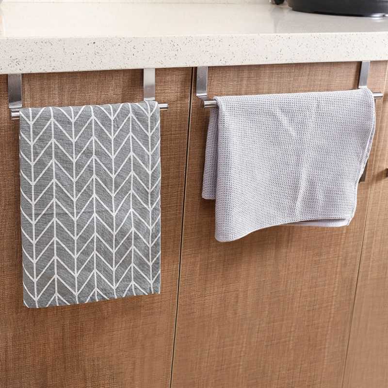 tea-towel-rails-hanging-over-kitchen-cupboard.jpg