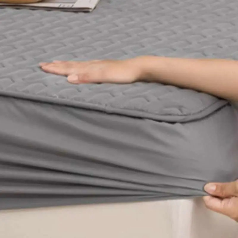 fitting-a-mattress-cover--on-a-mattress.webp