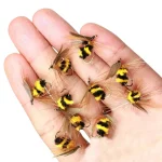 thumb_10-bee-fishing-flies-held-in-hand.webp