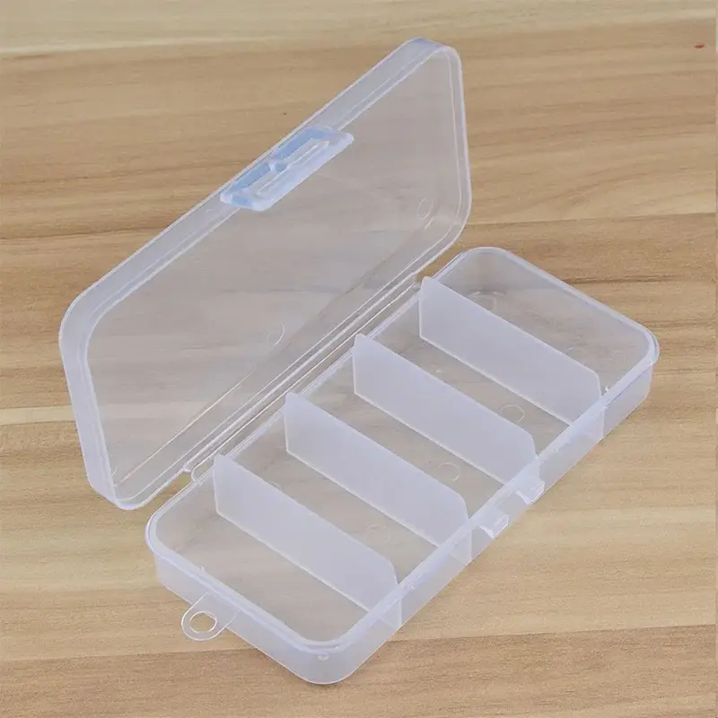 small-tackle-box-for-fishing-on-a-table.webp