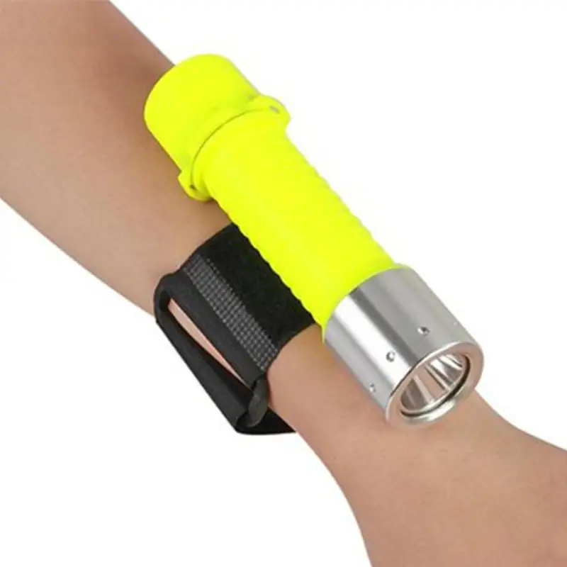 yellow-waterproof-torch-on-arm-using-a-wrist-mount-strap.webp