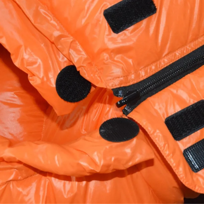 orange-sleeping-bag-fasteners.webp