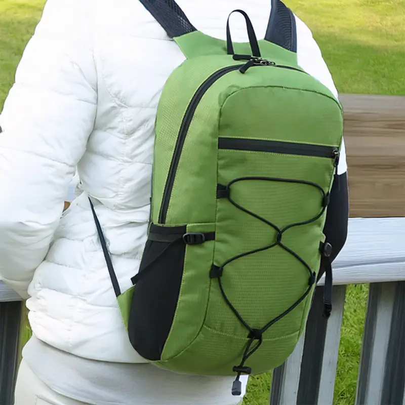 small-green-backpack-on-someones-back.webp