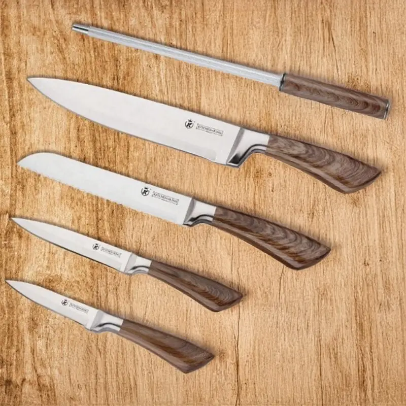 Stainless-Steel-Knives-Laid-out-on-a-table-for-display.webp