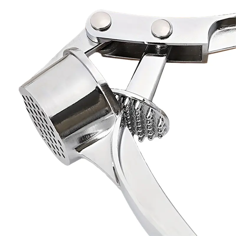 tool-for-crushing-garlic-cloves.webp