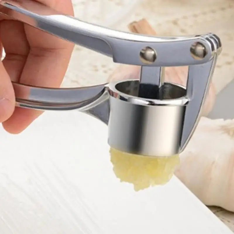 using-a-garlic-crusher.webp