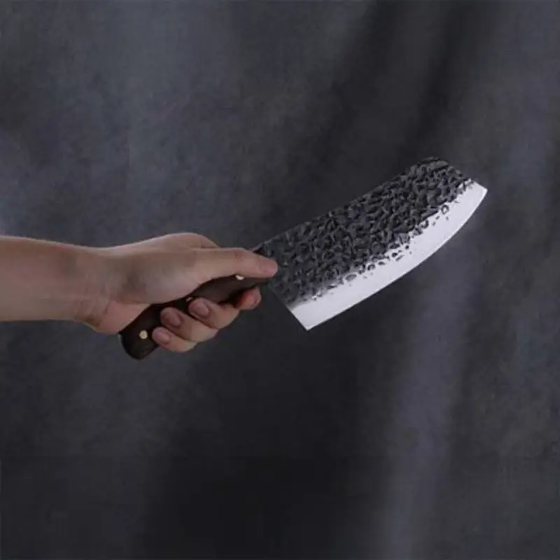 Kitchen-CLeaver-held-in-hand.webp