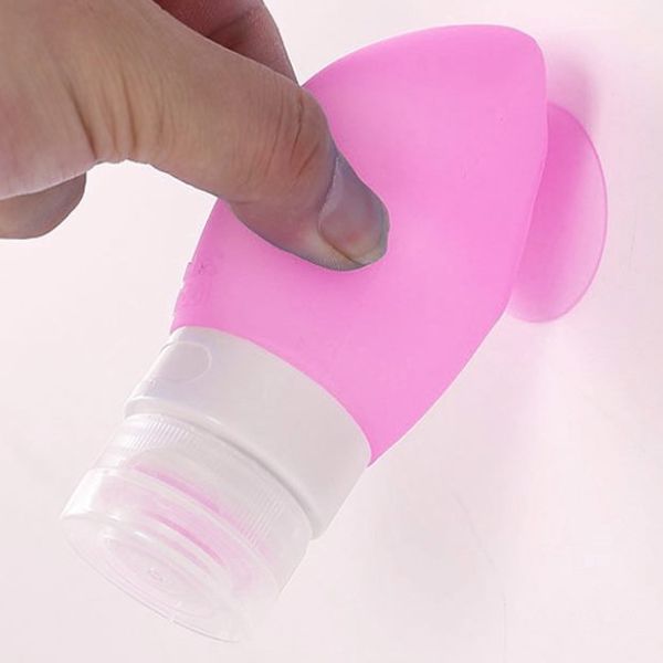 Silicone-Toiletry-Travel-Bottles-4-Pack-with-Storage-Pouch-(3).jpg