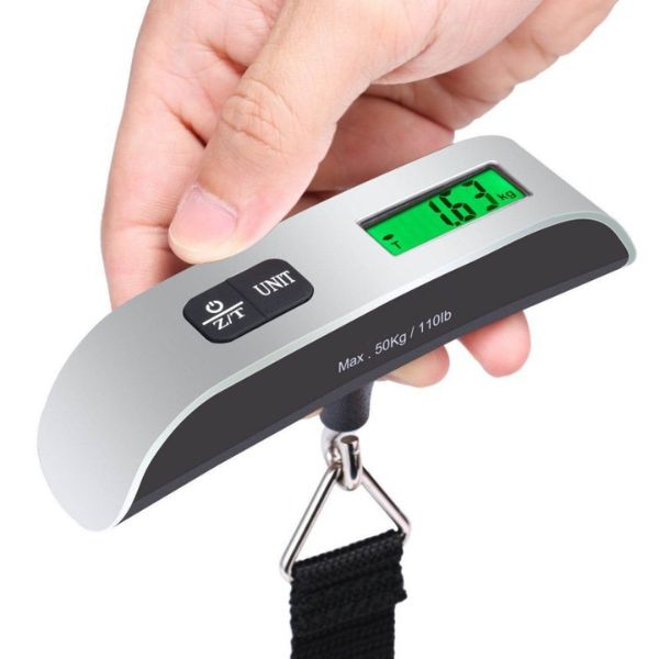 hand-held-scales-been-used-to-weight-suitcase.jpg