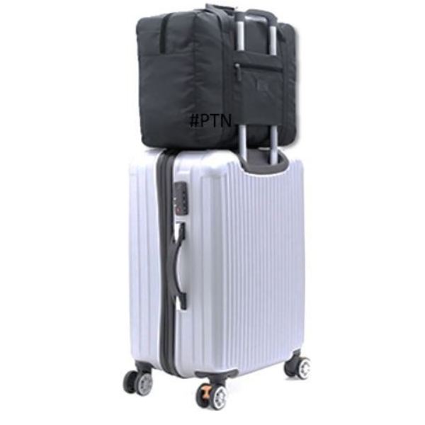 foldable-travel-bag-on-top-of-suitcase.jpg